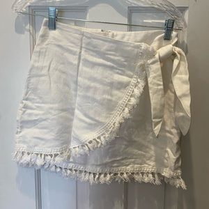 White tassel mini skirt with wrap tie
